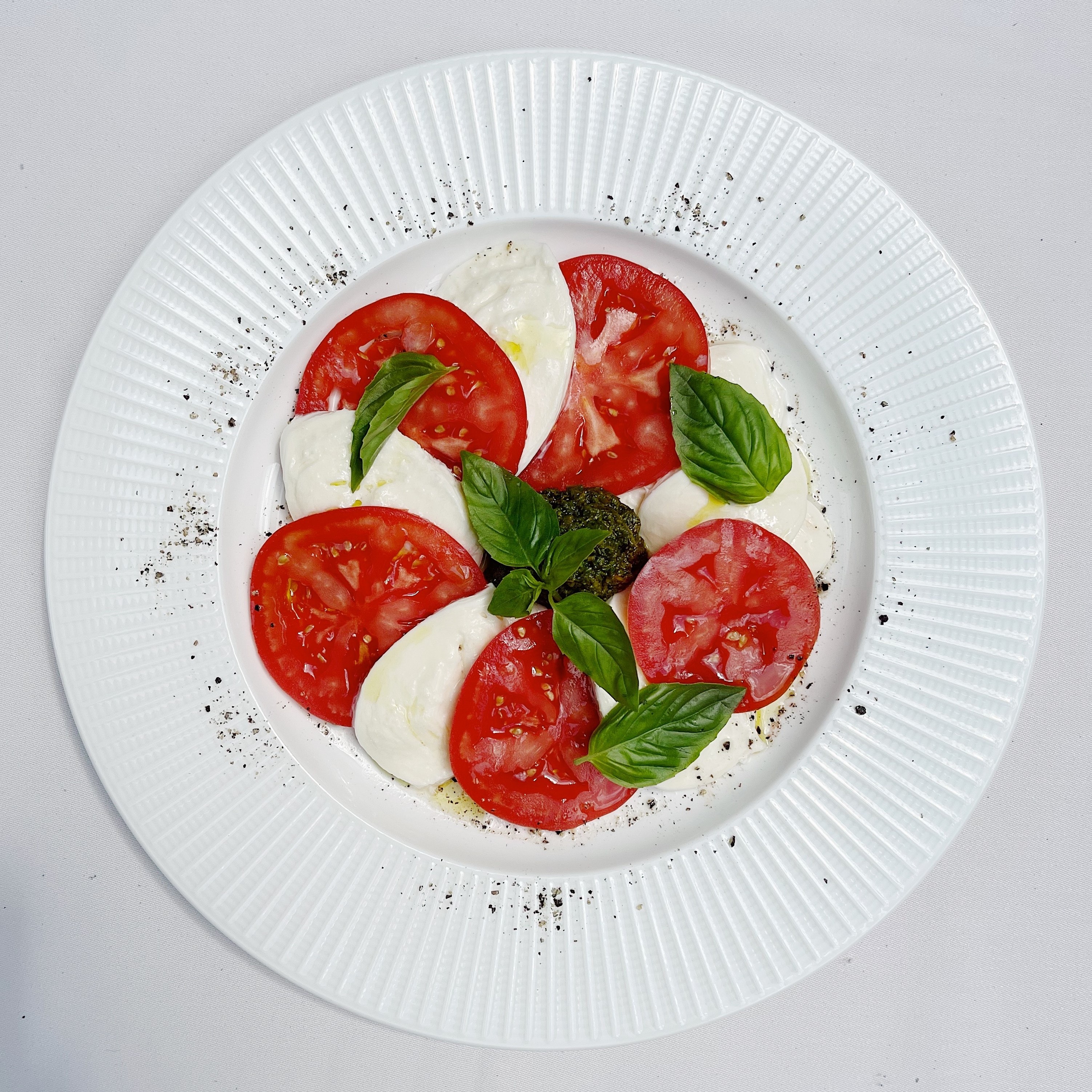 Overhead shot of a plate of caprese salad